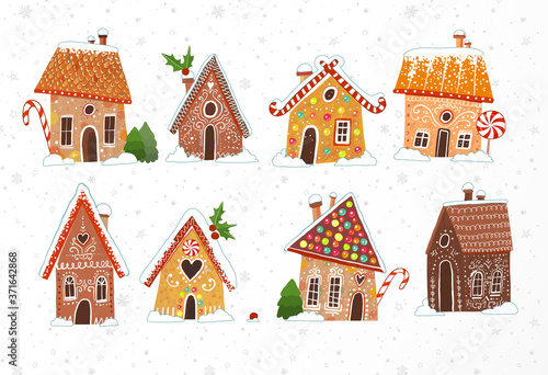 Set of cute gingerbread houses with christmas decorations on white background.