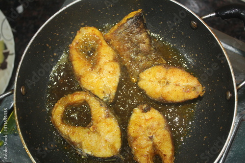 delicious fish fry in hot oil on pan tasty rohu fish frying on hot pan oil fried fish