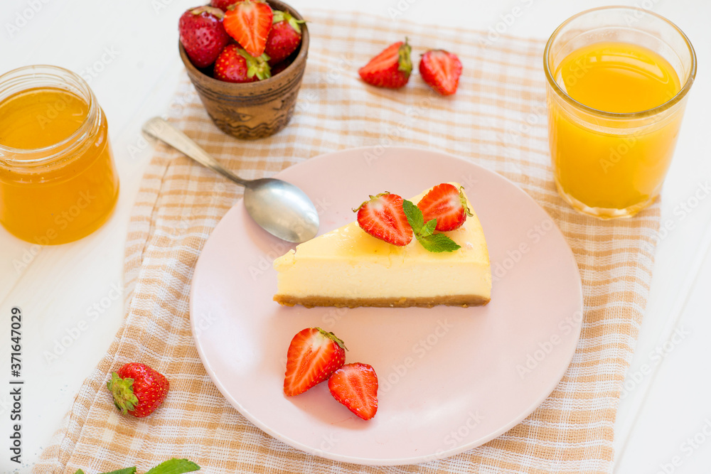 cheesecake with strawberries and honey, delicious breakfast, homemade dessert
cheesecake with strawberries and honey, delicious breakfast, homemade dessert
