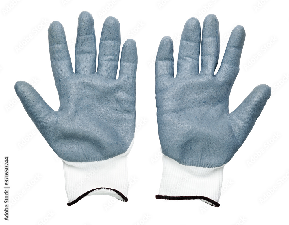 Obraz premium Isolated construction rubberized gloves on a white background. Blue protective gloves for construction and operation with caustic substances. Rubber gloves for repair.