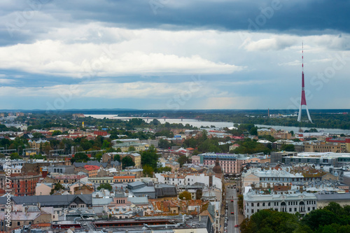 Picturesque detailed bird's eye view on tiny colorful houses of capital of Latvia, Riga in rainy day. Vacation in europian cities.