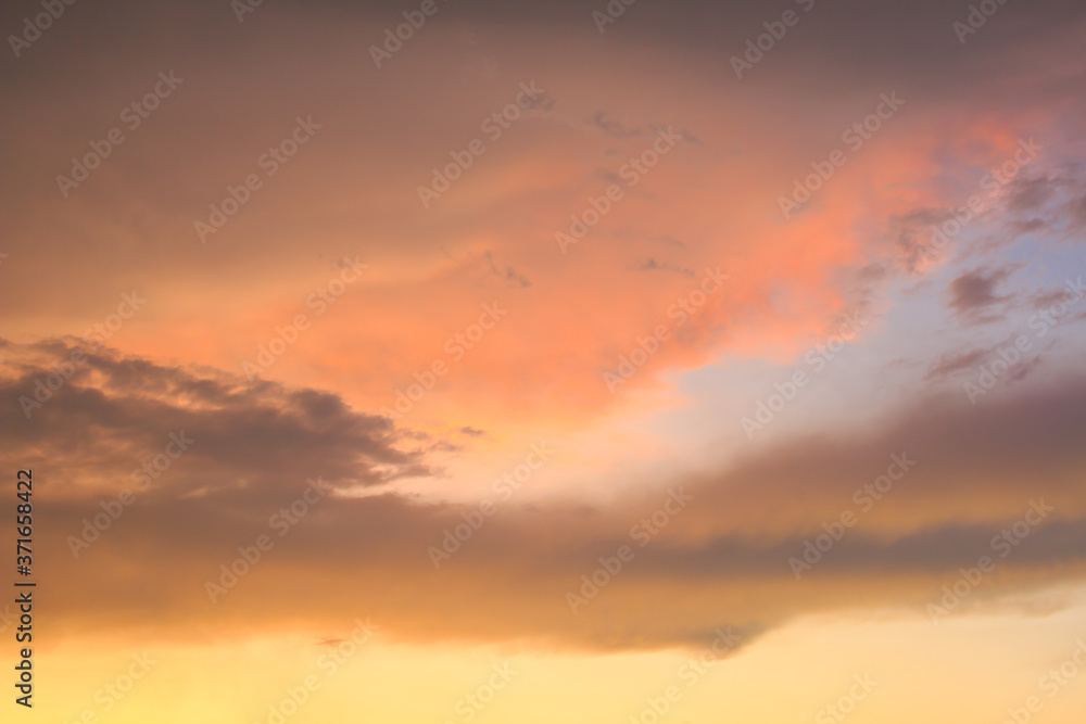 An orange and yellow sky with clouds. , Beautiful sky