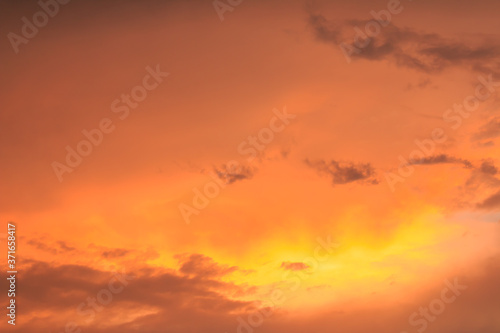 Obraz na płótnie An orange and yellow sky with clouds. , Beautiful sky w salonie