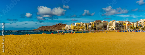A panorama view of the main beach in Las Palmas, Gran Canaria on a sunny day