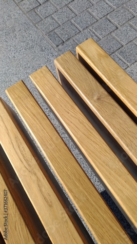 Texture of lacquered wood on a bench