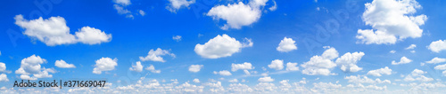 Beautiful summer blue sky landscape with floating white clouds, panorama, banner, as background
