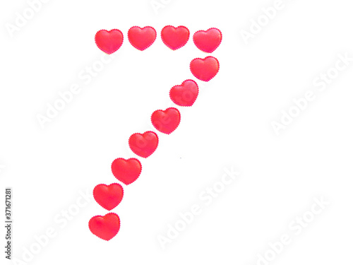 The number seven is made up of small red hearts isolated on a white background. Bright red font.