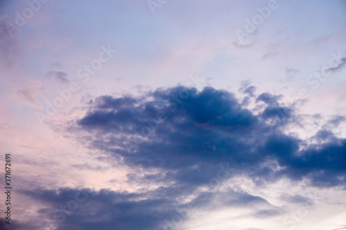 Beautiful textured sky with clouds at sunset © Alik Mulikov