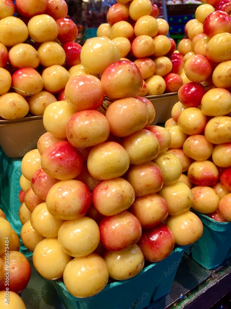 Yellow and red cherries at Granville Island Outdoor Public Market, Vancouver, Canada, shallow/depth of field, close up Yellow and red cherries at Granville Island Outdoor Public Market, Vancouver, Canada, shallow/depth of field, close up