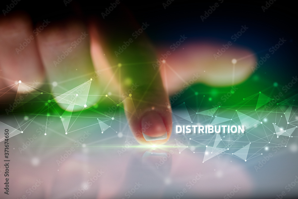 Finger touching tablet with DISTRIBUTION inscription, business concept Finger touching tablet with DISTRIBUTION inscription, business concept