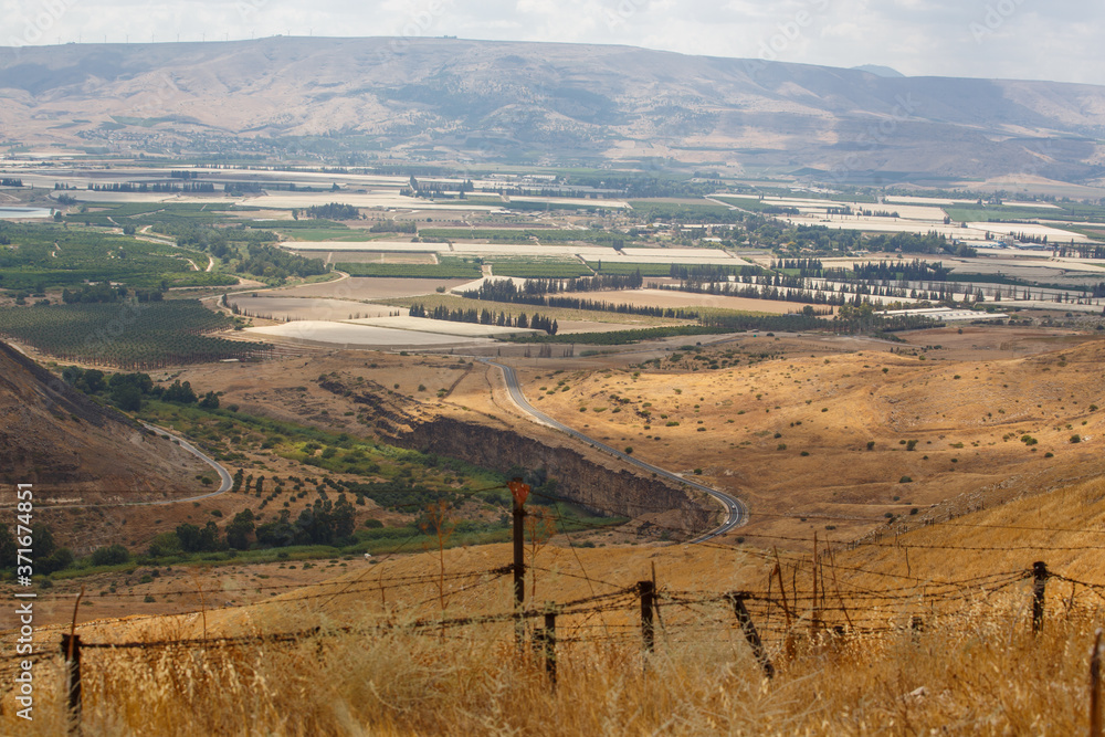 Naklejka premium A sign Danger Mines on Golan Heights, Israel