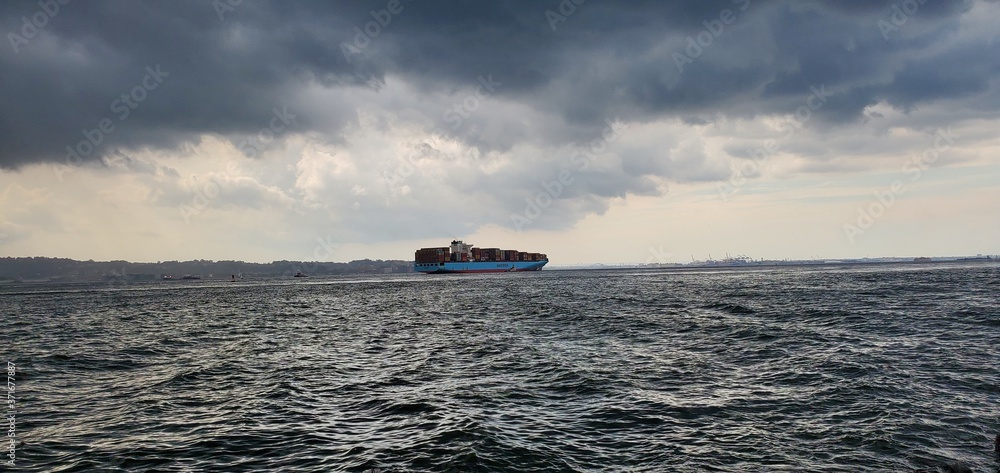 Ship on ocean horizon