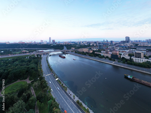 panoramic view of the big river in the city at sunrise