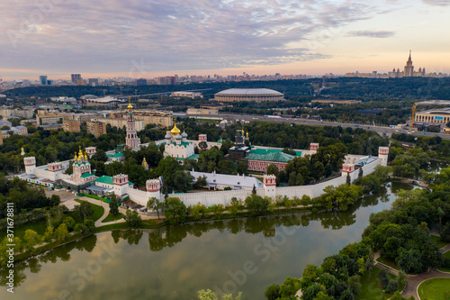 panoramic views of the city, the ancient fortress and the river at dawn filmed from a drone © константин константи