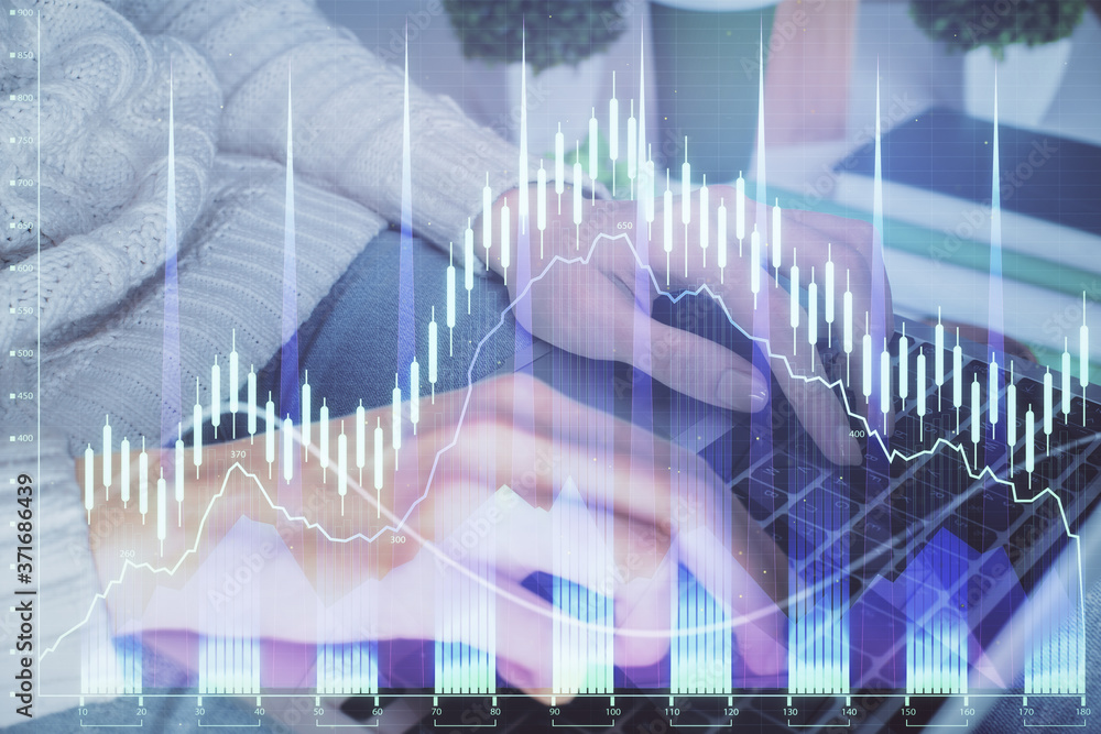 Double exposure of woman hands typing on computer and forex chart hologram drawing. Stock market invest concept. Double exposure of woman hands typing on computer and forex chart hologram drawing. Stock market invest concept.
