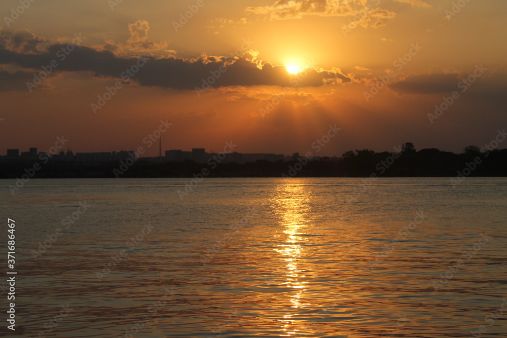 sunset over the river sunset over the river