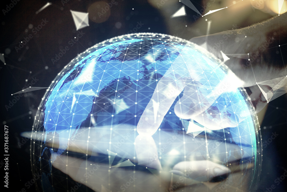 Double exposure of man's hands holding and using a phone and international business theme drawing. Double exposure of man's hands holding and using a phone and international business theme drawing.