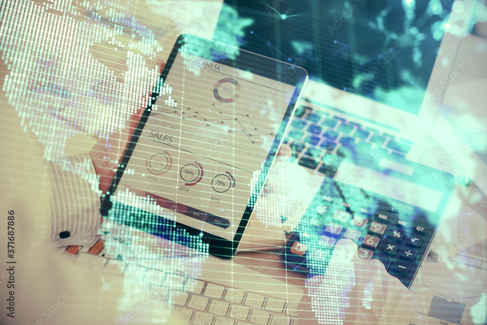 Double exposure of man's hands holding and using a phone and international business theme drawing. Double exposure of man's hands holding and using a phone and international business theme drawing.