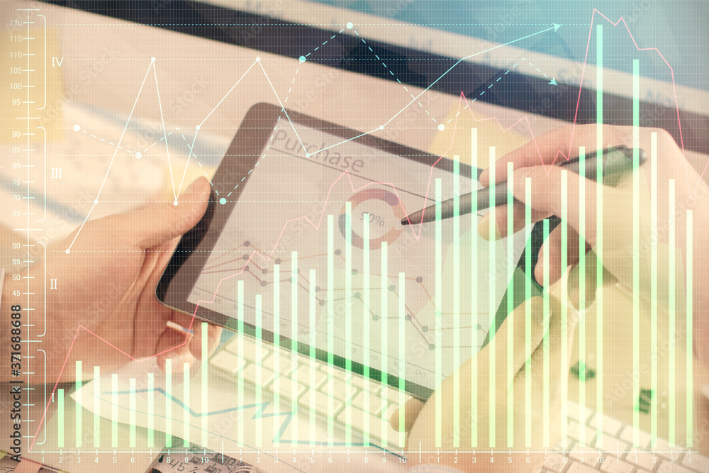 Double exposure of man's hands holding and using a phone and financial chart drawing. Market analysis concept. Double exposure of man's hands holding and using a phone and financial chart drawing. Market analysis concept.
