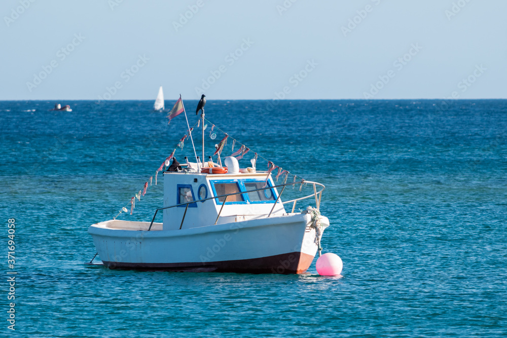 Picture of a small fishing boat on the island of lanzarote, the canary islands