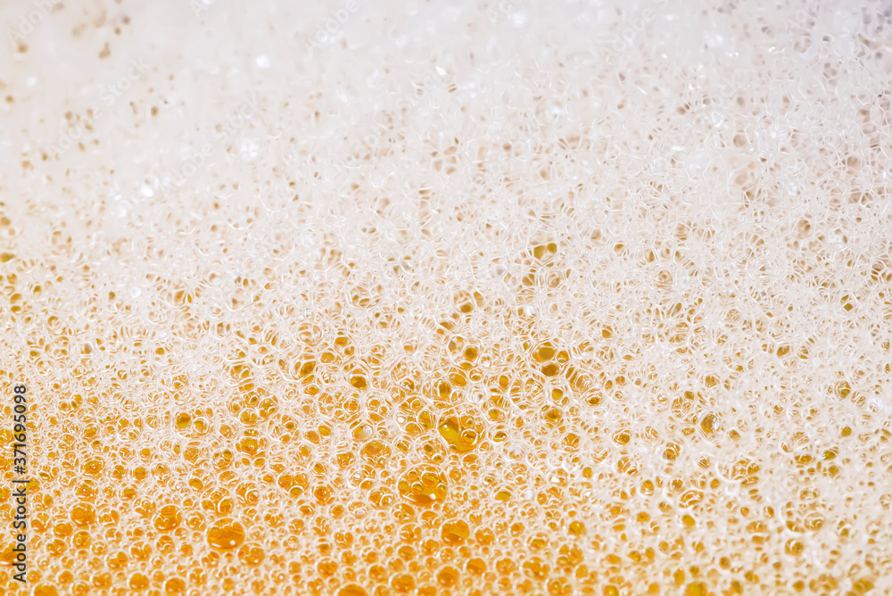 Macro photo of beer or soap foam and bubbles background Macro photo of beer or soap foam and bubbles background
