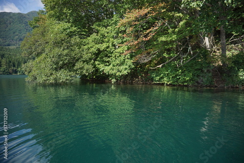 A calm lake in the morning in Japan, Nagano, Aoki lake