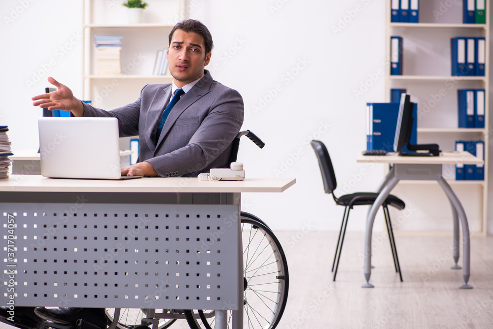 Disabled employee in the office Disabled employee in the office