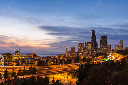 Seattle skyline and interstate highway at dusk