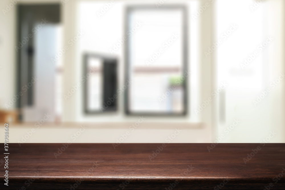 Wooden desk space and blurry background of home window for product display montage. Wooden desk space and blurry background of home window for product display montage.