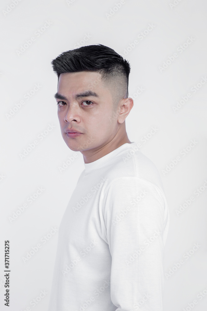 Closeup man wearing white longsleeve t shirt isolated on white background Closeup man wearing white longsleeve t shirt isolated on white background