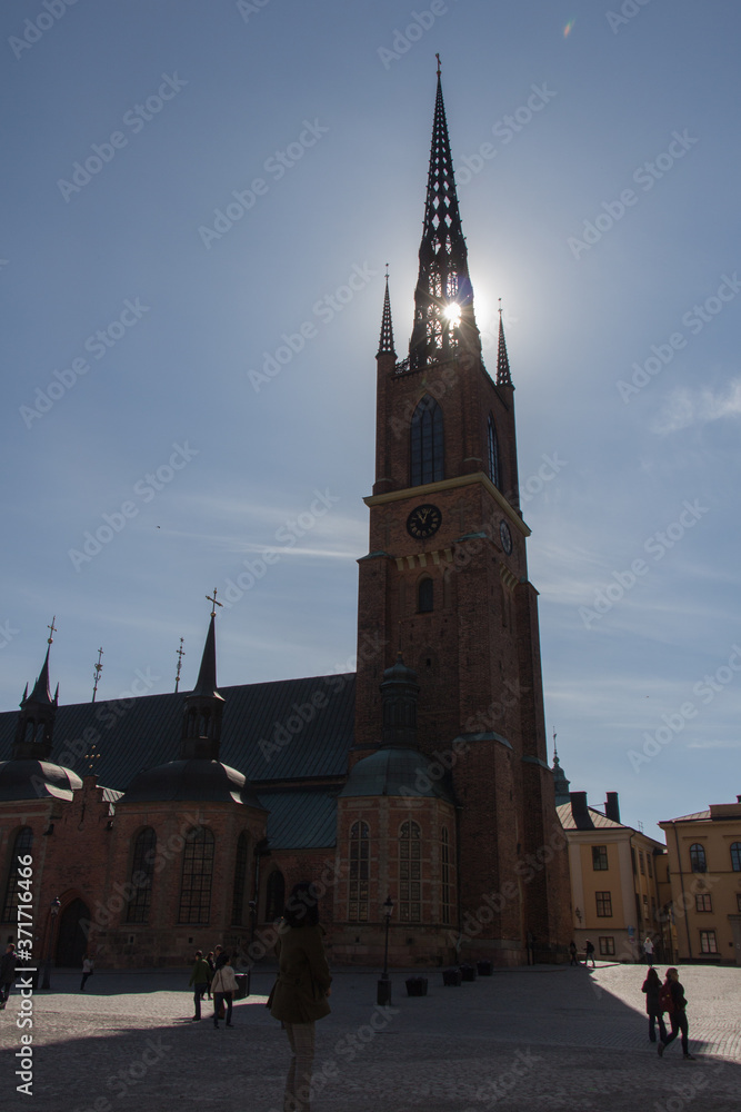 Obraz premium Stockholm, Sweden - April 21 2019: the view of Riddarholmen Church in a sunny day on April 21 2019 in Stockholm Sweden.