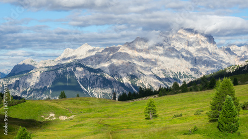 Wonderful landscape of the Dolomites overlooking the city of Cortina D'Ampezzo. View from Falzarego mountain pass. Dolomites Unesco world heritage. The most beautiful mountains on Earth. Summer time photo
