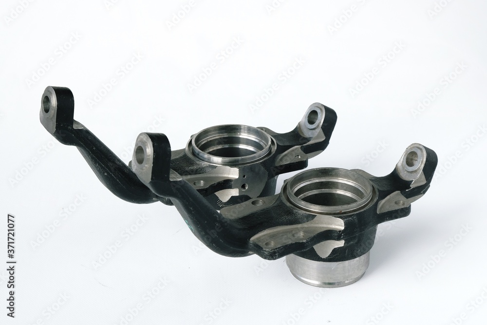 Close-up of car parts. Rotary knuckle . The left and right. Spare parts for repair and maintenance. Close-up of car parts. Rotary knuckle . The left and right. Spare parts for repair and maintenance.