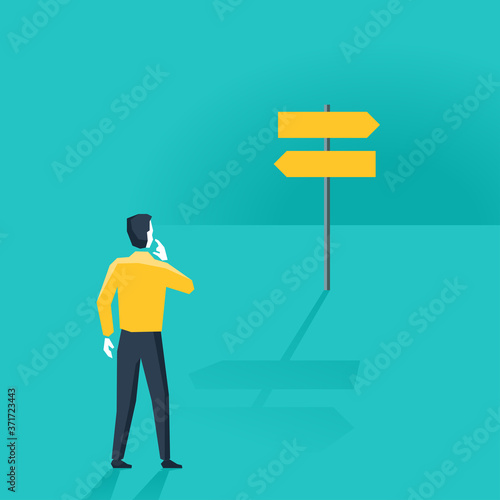Confused man looking at a roadsign (signboard) with keft and right different directions -  difficult choice select concept
