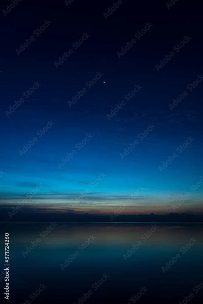 The sky with star at the lake in the twilight after sunset.