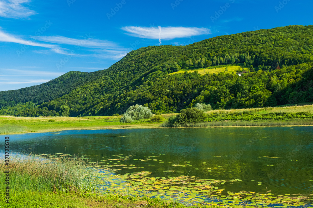 Beautiful nature, green landscape in Lika region on Svica lake, Croatia
