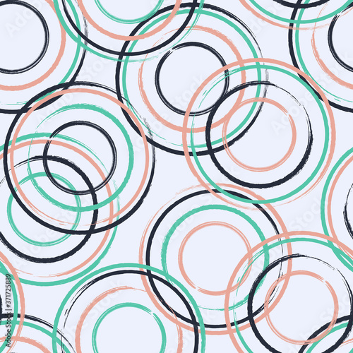 Abstract seamless pattern design with dry paint textured circles 