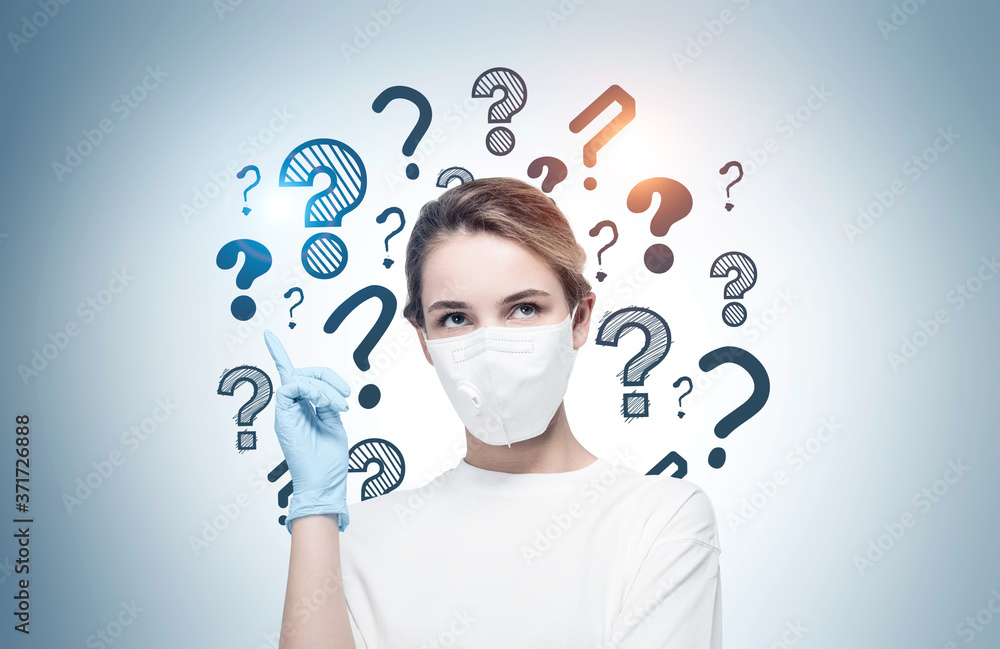 Woman in protective mask and question marks Woman in protective mask and question marks
