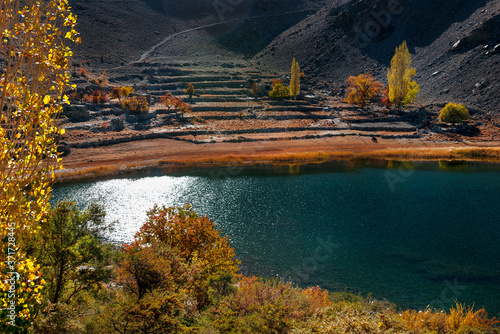 borith lake panoramic view , autumn landscape with sky and clouds in upper hunza, gojal , gilgit baltistan	 photo