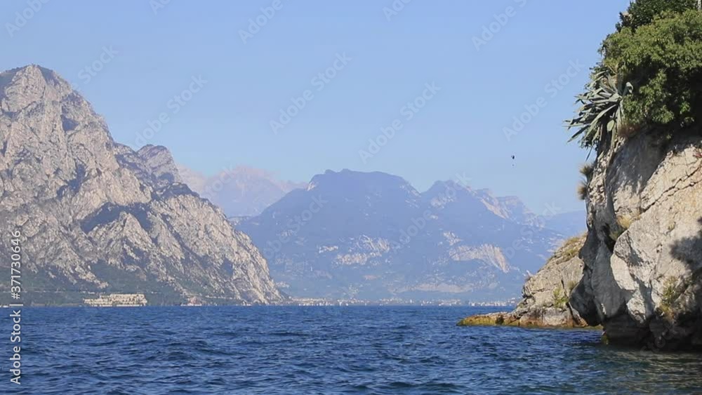 The view towards the north of Lake Garda from Malcesine. Malcesine is a resort town on the edge of Lake Garda in North East Italy. The view towards the north of Lake Garda from Malcesine. Malcesine is a resort town on the edge of Lake Garda in North East Italy.