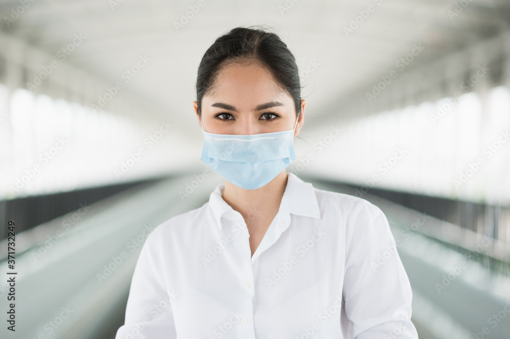Business woman wearing protection mask. Beautiful female protective virus and pollution with face mask. Business woman wearing protection mask. Beautiful female protective virus and pollution with face mask.
