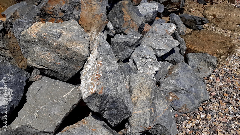 Big stone floor texture photo at the park, with colorful stones copy space in countryside, Thailand Big stone floor texture photo at the park, with colorful stones copy space in countryside, Thailand