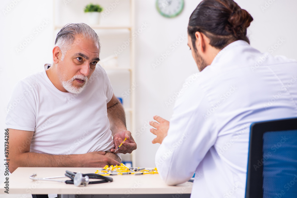 Fototapeta premium Patient suffering from diabetes visiting doctor