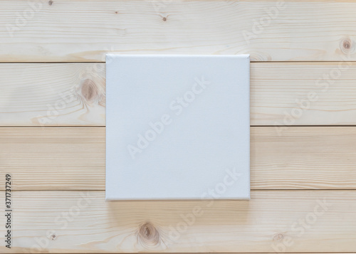 Blank canvas frame mockup rectangular size on white wood wall for arts painting and photo hanging interior decoration