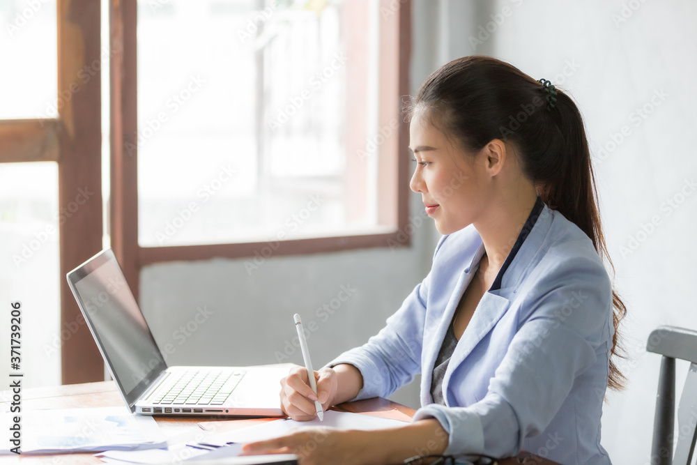 Business asian woman working at home with online technology Business asian woman working at home with online technology