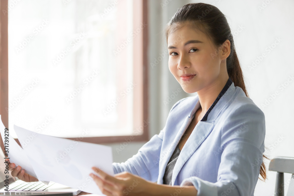Business asian woman working at home with online technology Business asian woman working at home with online technology