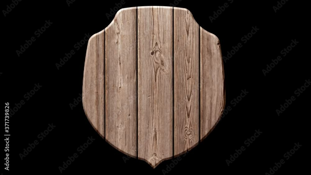 A wooden sign in the form of a shield is assembled from planks. A wooden sign in the form of a shield is assembled from planks.
