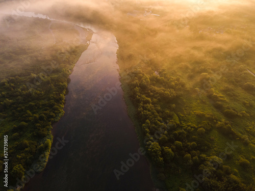 Magical Sunrise over Dunajec River in Poland. Fog Over Forest. Drone View © marcin jucha