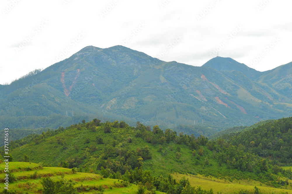 distant mountains with landslides during rains