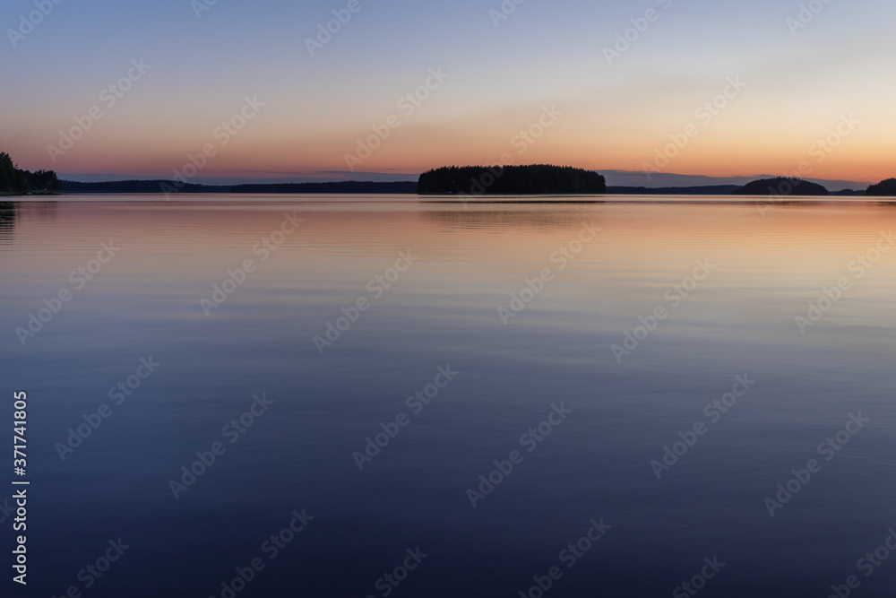 Late summer time sunset on the lake in Lappeenranta, Finland